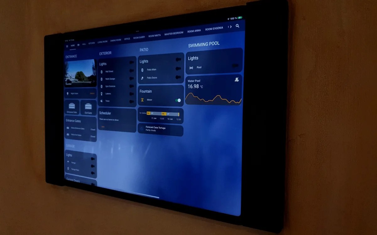 Wall-mounted local Home Assistant dashboard in a private villa